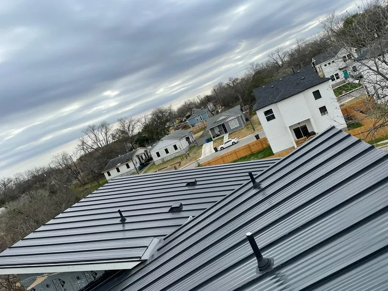 Standing seam metal roof panels with vents for Skylight Repair in Vincennes